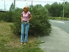 young redhead peeing in public