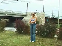 young blonde peeing in public