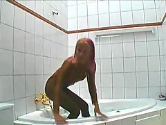Cynthia taking a bath in nylons