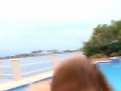 Redhead Alexa threesome by the pool