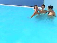 Three babes one lucky guy in pool