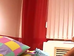 Pigtailed russian teen stripping