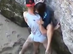 Hong Kong girl fucking a white guy at a beach coner