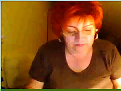 This red haired gran loves to give a web cam show