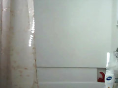 Chick in shower with Dildo