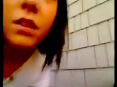 Young woman films self masturbating on front porch