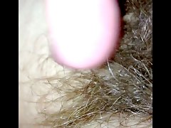 real close up of her hairy pussy.