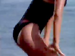 Carmen Electra in a black swimsuit 
