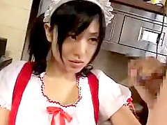 Cute Asian waitress giving the boss a blow