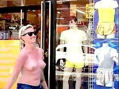 Woman walking topless through NYC 