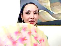 Asian MILF Creamed On Her Big Tits