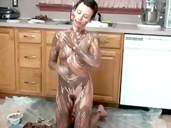 Skinny cutie rubs chocolate over her whole