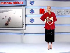 Tasty chick doing the news and stripping 
