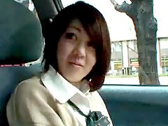 Japanese girl playing naughty in the car