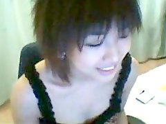 Sexy Asian girl with hot tits on webcam