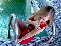 cute babe teasing on swimming pool