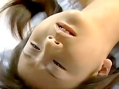 Pigtailed masturbating Japanese girl