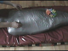Mummified slave and many colorful clips 