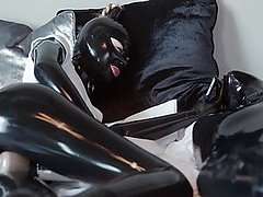 Latex Catsuit in bed 