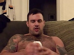 Hairy tatted stud has fun with vibrating pocket masturbator