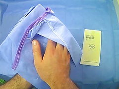 SIGN IN Putting On Your Gown And Gloves In A Sterile 