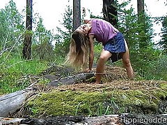 Hairy girl masturbating in nature