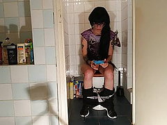 Sexy goth teen pees while playing 