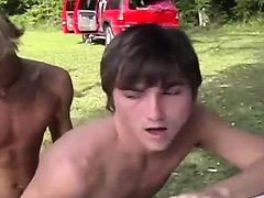 Two young twinks fuck outside at camp for boys