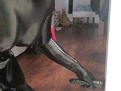 Rubber latex sissy in gasmask plays with 