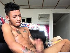 Latin stud oils body before jerking thick cock