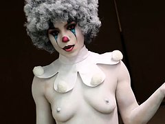 Sexy babe wears clown makeup a