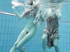 Two dressed beauties underwater ndash Netrebko and Poleshuk 