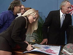 Hot ladies in stockings fuck some dudes on an office desk