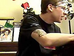 Tattooed boy in glasses jerks off solo 