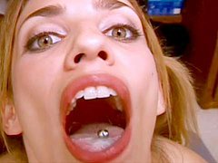 Gena gets a big load on her tongue 