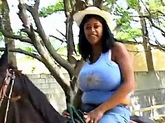 Big tits bounce as a sexy girl goes horseback riding