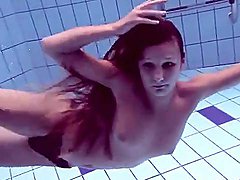 Bikini teen takes off her top in the pool 