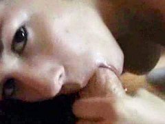 Sexy brunette is giving a nice deep blowjob 