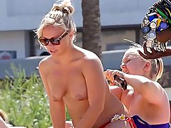 Topless blonde hottie spied on at the beach 
