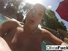 Olivia Austin has some summer fun in the pool 