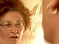 Cocksucking granny fucked in her hairy pussy