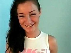 Teen in skintight tee does a sexy striptease 