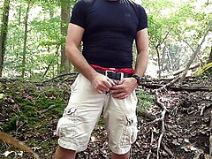 I am wanking in the woods,jerking off and cum on my shorts!