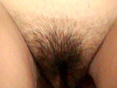 Hairy babe is pissing with pleasure 