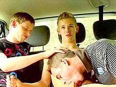Gorgeous gay sucks two dicks in the car 