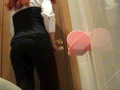 Hottest redhead model is peeing in the toilet 