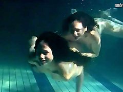 Underwater workout and fun with two beauties 