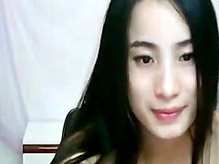 Cute Asian webcam girl models her tits 