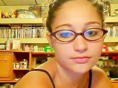 Babe in cute glasses is fucking on the webcam 