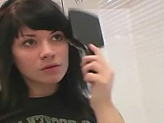 Cute raven haired teen teasing in the mirror 
